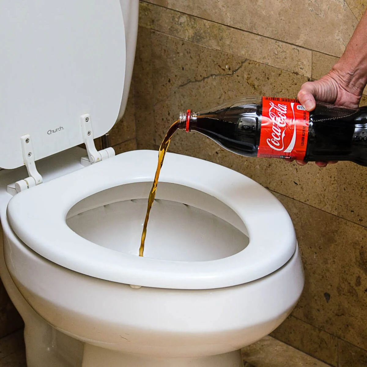 clean a toilet with coke